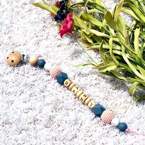 Wooden lettered pacifier clips