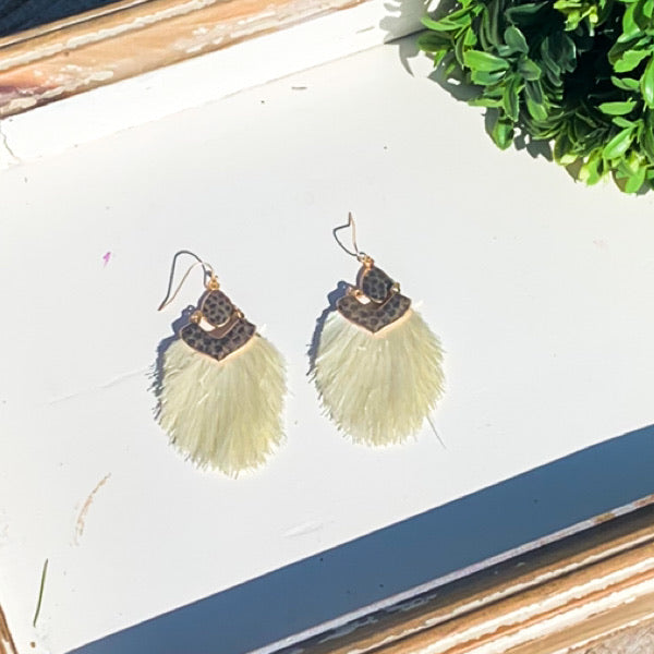 Metal and fringe earrings