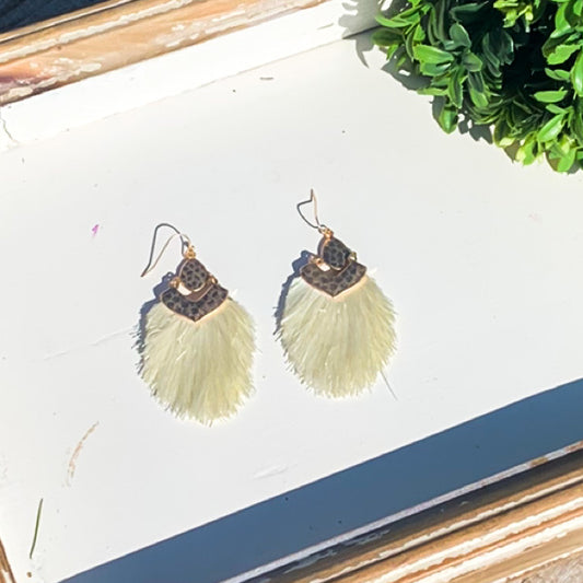 Metal and fringe earrings