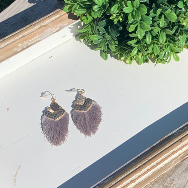 Metal and fringe earrings