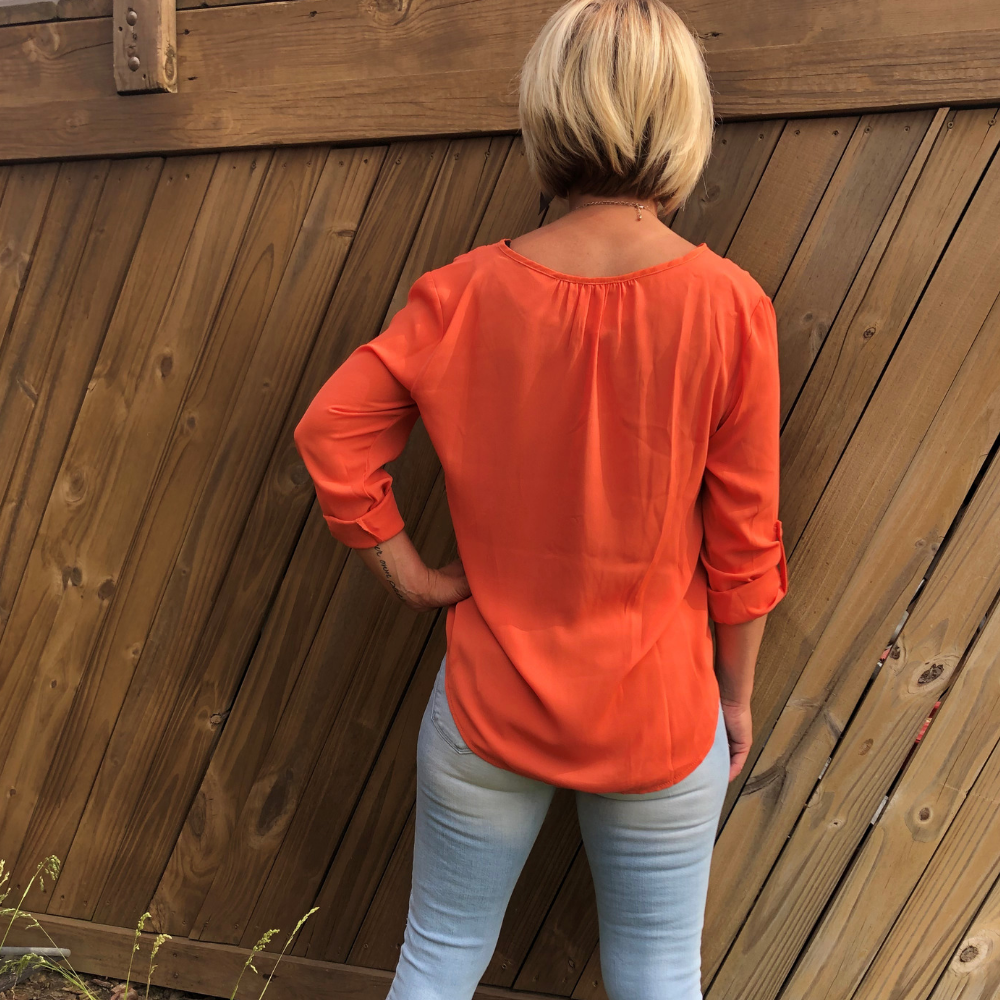 The back image of the top on a women 